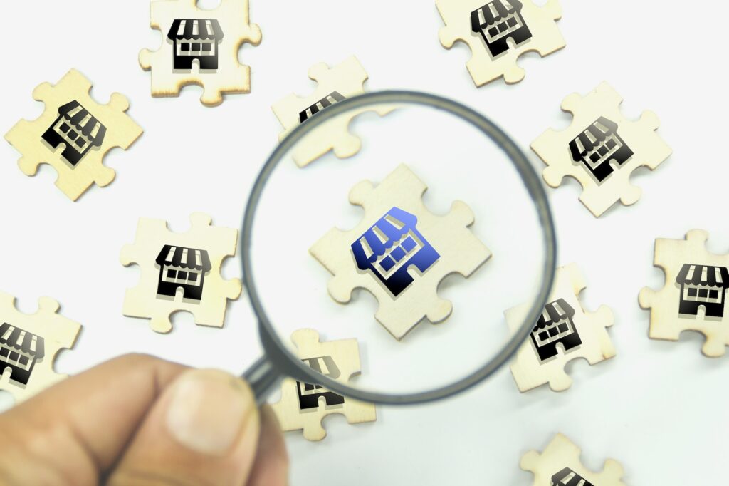 magnifying-glass-looking-for-a-merchant-or-business-looking-for-a-store-1024x682